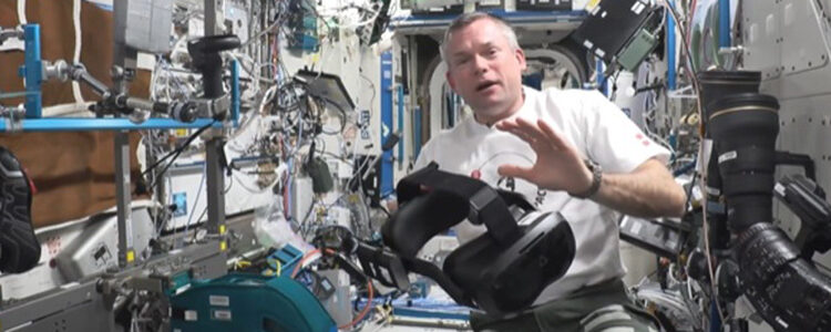 Andreas Mogensen with the Virtual Reality headset used to provide Syncsenses' nature experiences during execersise on the International Space Station. Photo: ESA / NASA ISS-Video